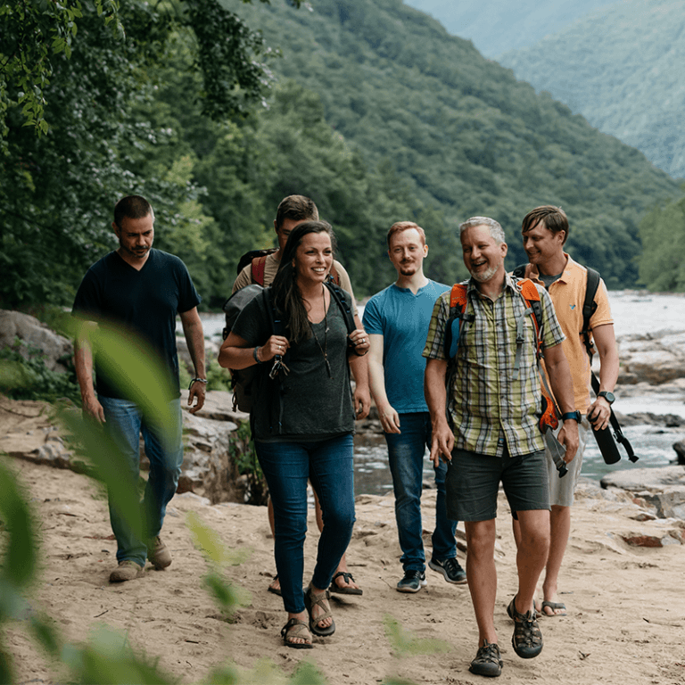 Ntarians walking along the Nolichucky river.