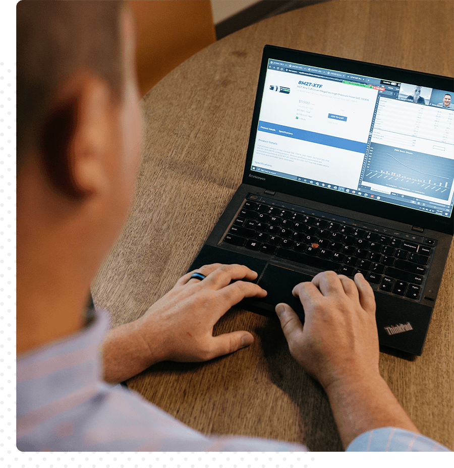 A man working on his laptop.