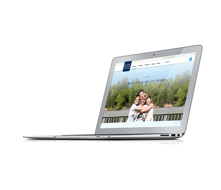 An image of a silver laptop with the Cardinal Innovations website pulled up.