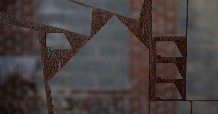 Abstract image of metal and brick.