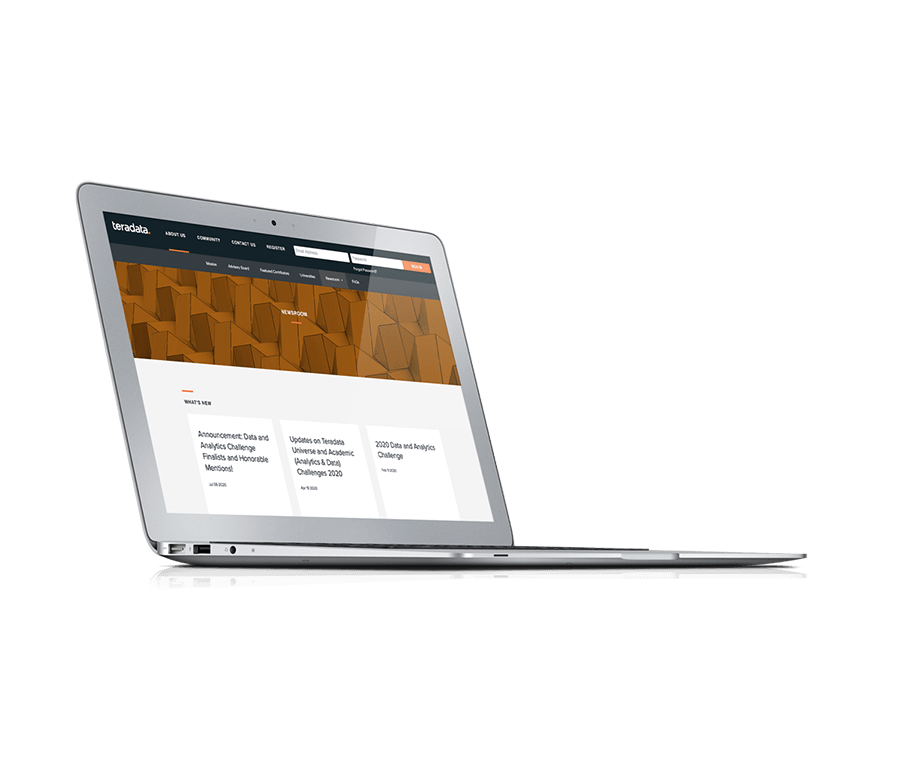 A rendering of a silver laptop with a website page on it.