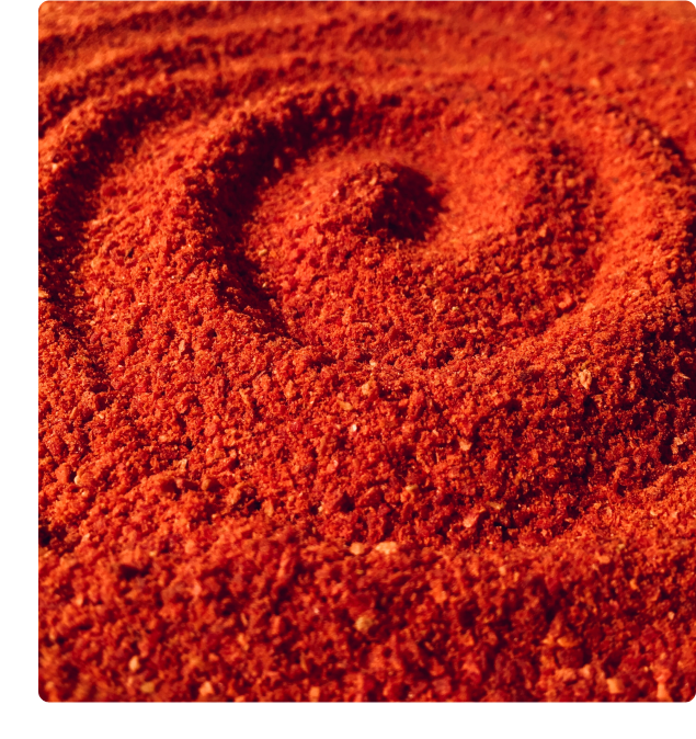 Group 148(1) Abstract image of red sand, swirled into a spiral.
