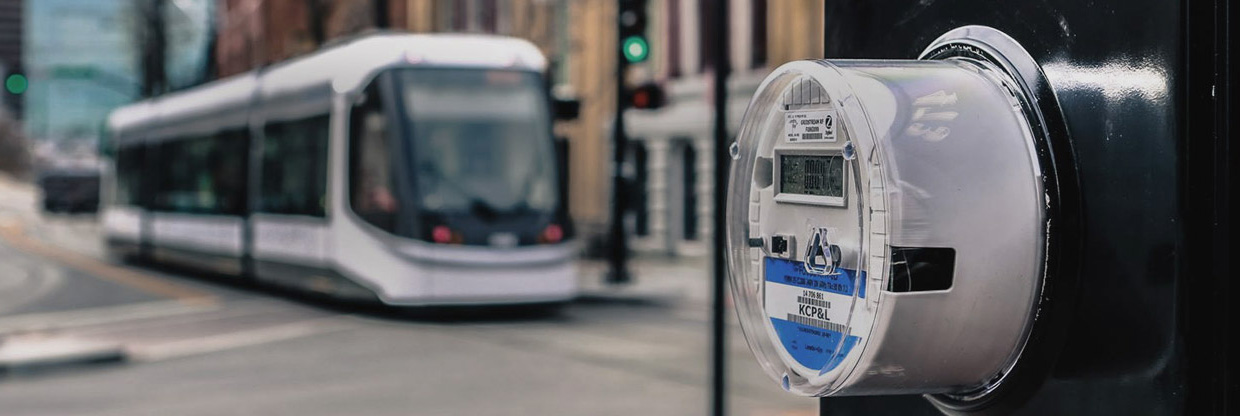 Image of a meter with a bus in the background